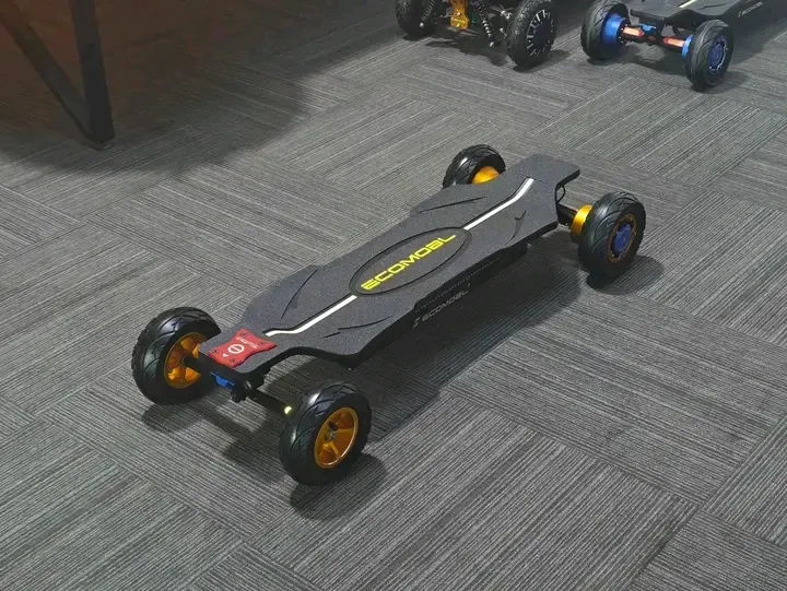 Electric Skateboard — Black & Gold (top view)