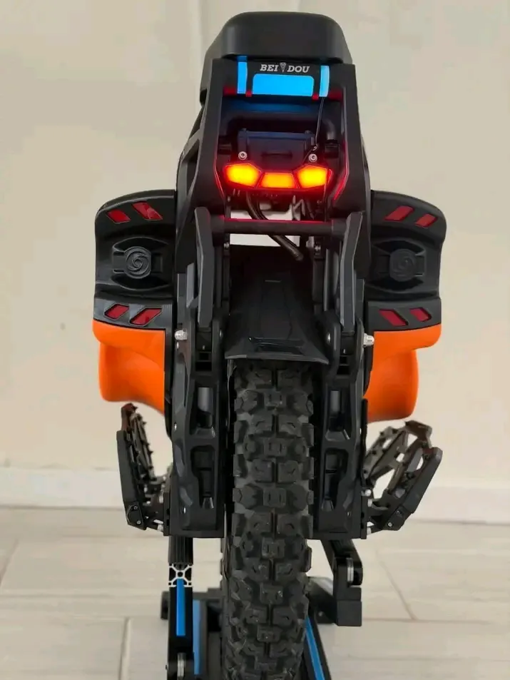 Electric Unicycle — Black & Orange (rear view)